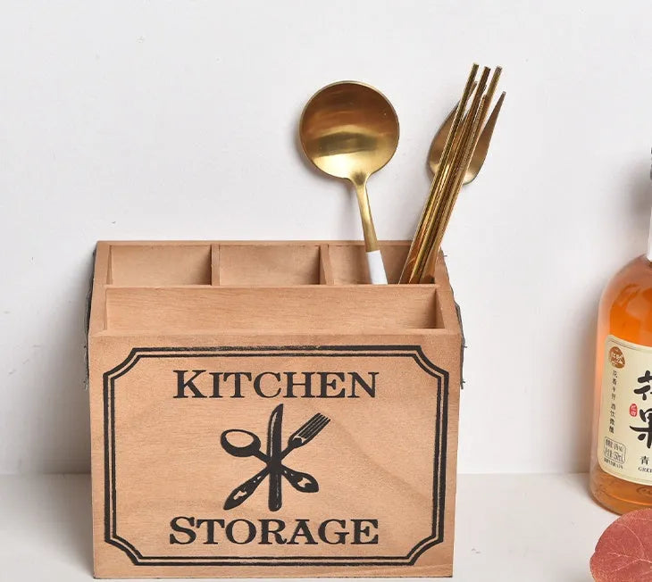 Wooden kitchen storage box for knives, forks, and chopsticks with internal dividers.