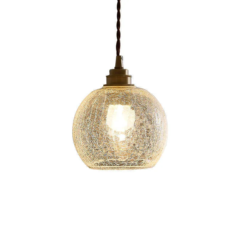 Brass and glass ball chandelier with copper body and clear spherical shade, shown in diamond colour.