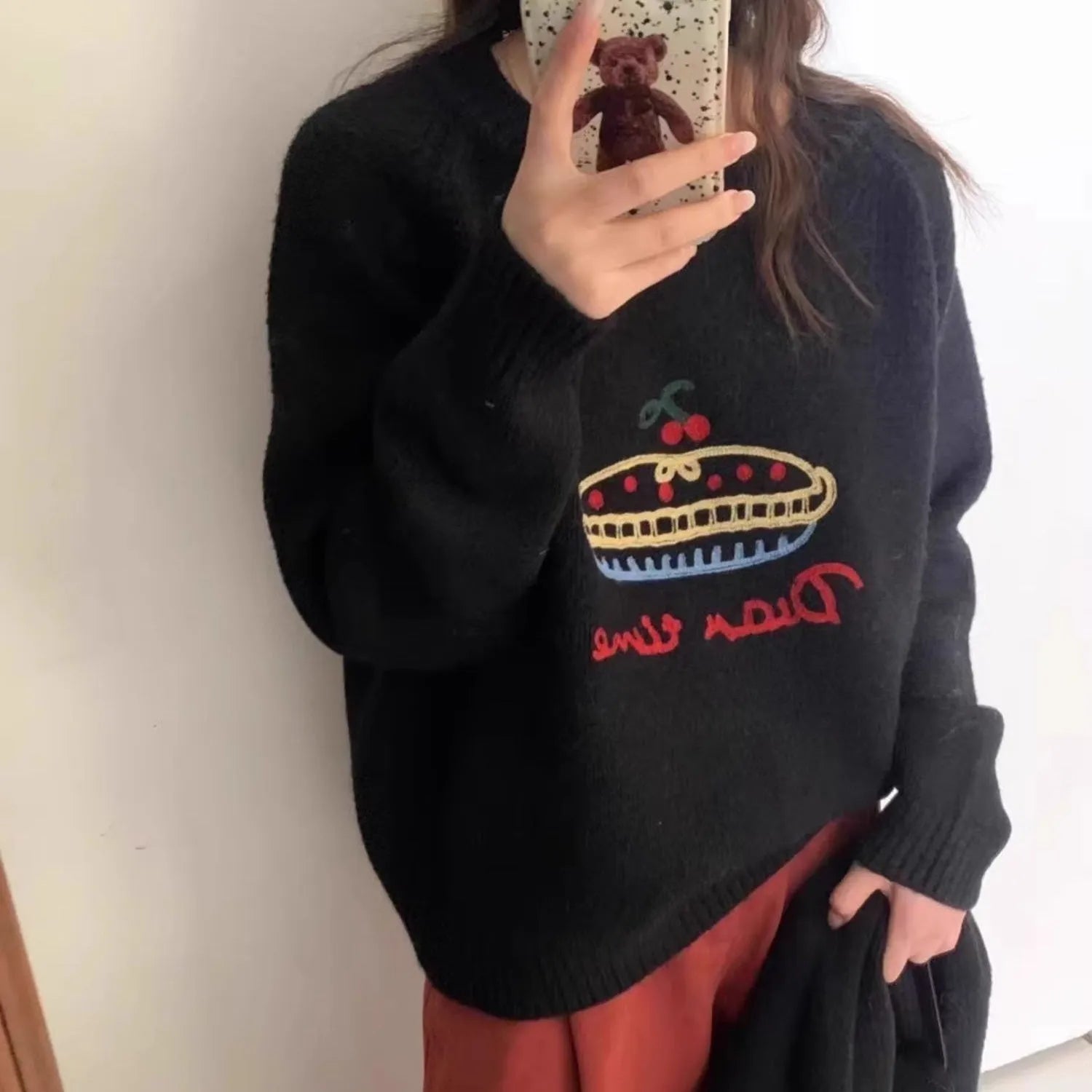 Women's loose fit round neck embroidered cartoon sweater in beige with long sleeves and acrylic spandex fabric