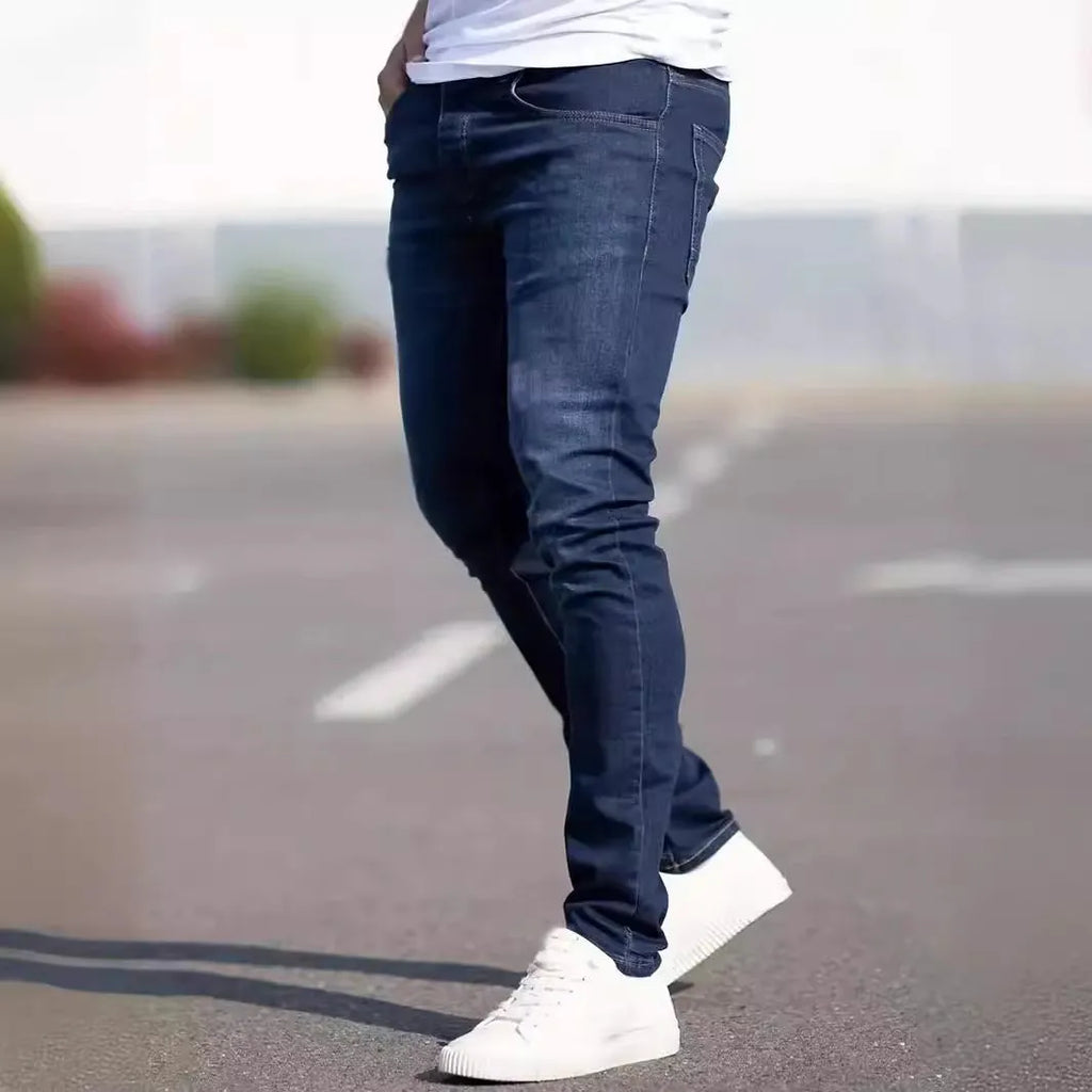 Dark blue men's slim fit casual jeans with medium elastic cotton construction