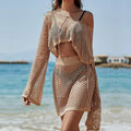 Khaki women's bell sleeve sun protection top and skirt set with hollow out design on a hanger.