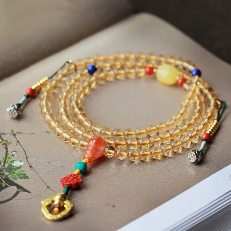Natural citrine bracelet with 1mm yellow beads on filament string, light luxury style