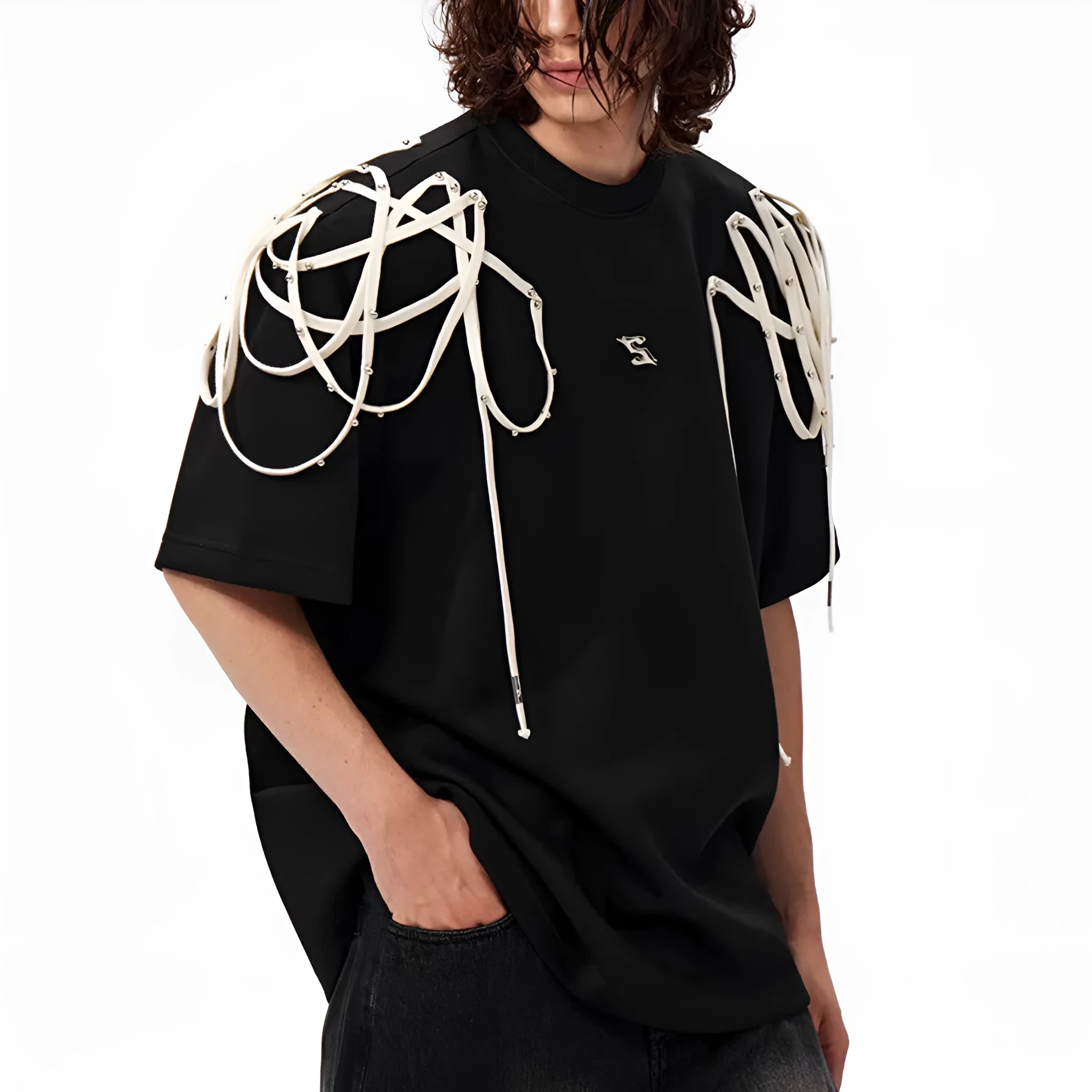 Black loose fit T-shirt with padded shoulder detail and rivet ribbon accent.