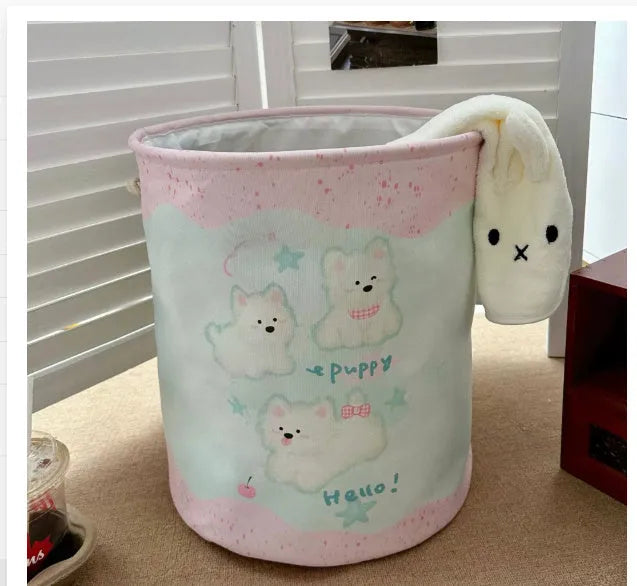 Foldable cotton cloth laundry basket in a character print colour, shown unfolded for use.