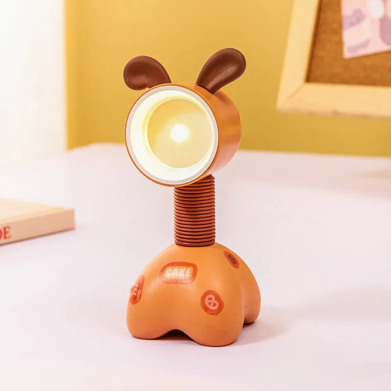 DIY magnetic cartoon small night lamp with multi-angle adjustable lighting on desktop
