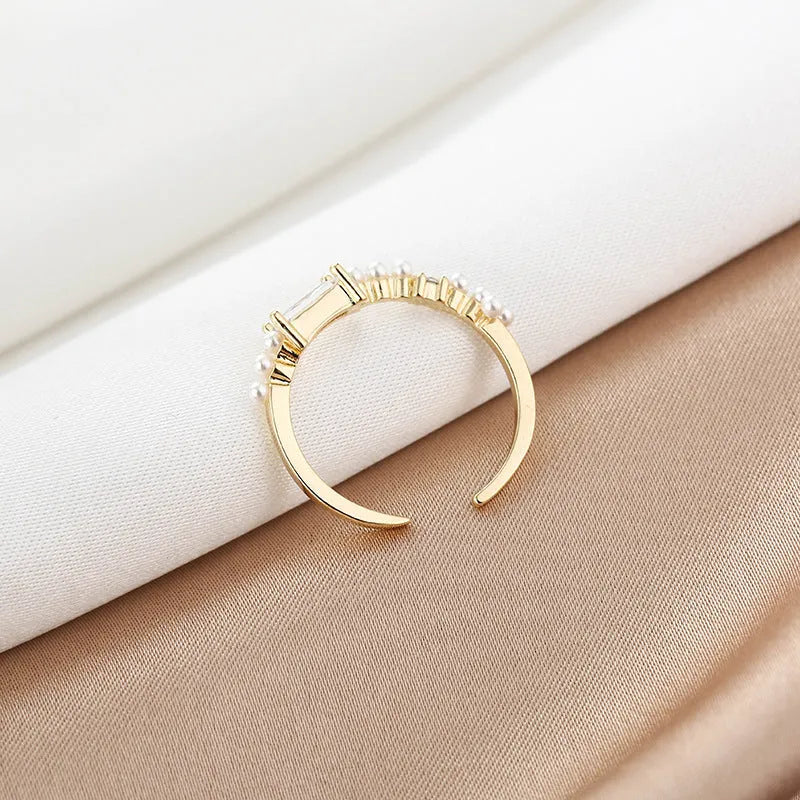 Women's gold-toned square alloy ring with diamond-cut surface and inlaid artificial gemstone on adjustable band