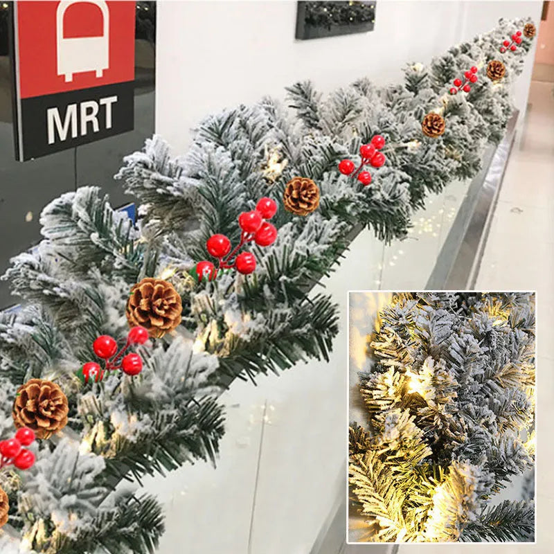 Artificial rattan Christmas garland with flocking snow effect draped on mantelpiece