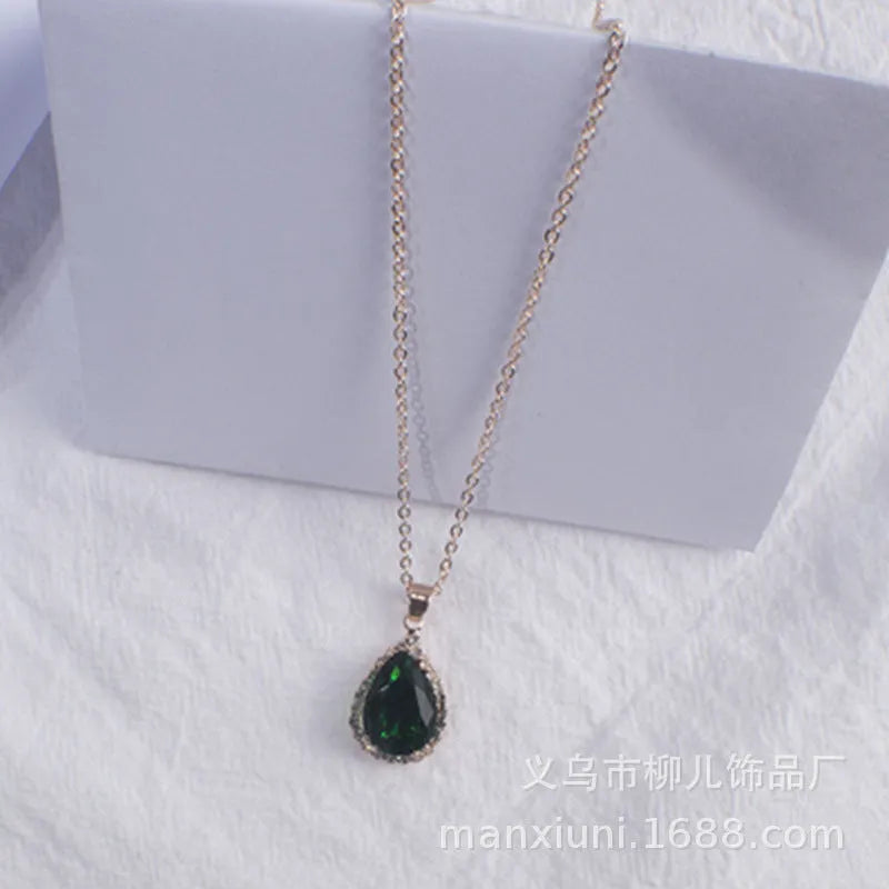 Pink rose gold drop shape rhinestone necklace with geometric design on alloy chain