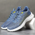 Women's lavender purple Flyknit mesh running shoes with round toe and flat wedge heel on a white background.