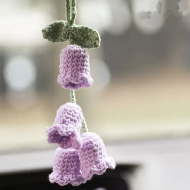 Green and white fish-scale style knitted wool car hanging planter with 8cm base and long white cord.