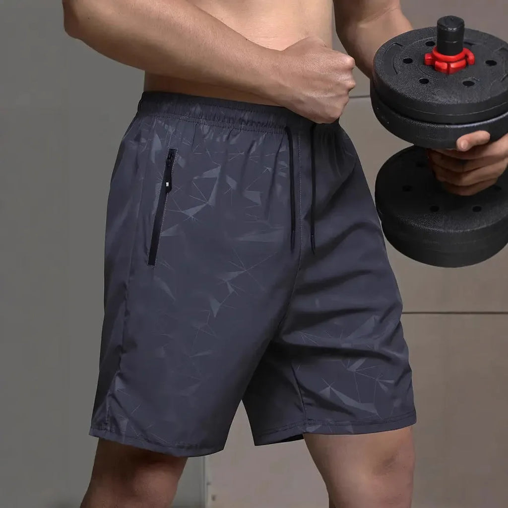 Men's loose fit polyester sports shorts in black colour with elastic waistband