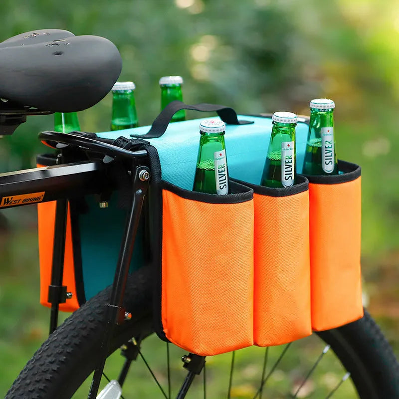 Black and orange bicycle drink bottle bag with two-sided storage compartments mounted on bike frame