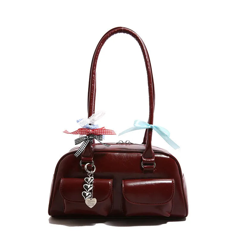 Retro pillow-shaped women's handbag in PU leather with double shoulder straps
