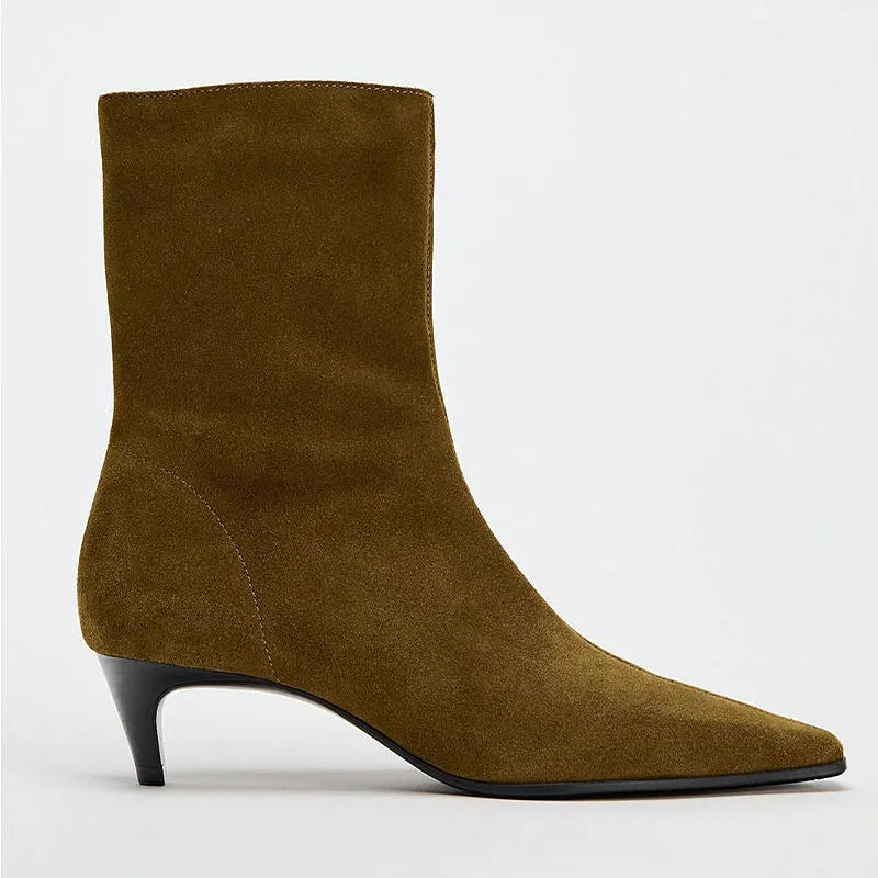 Brown women's square toe ankle boots with a side zipper and stiletto heel on a waterproof platform sole.