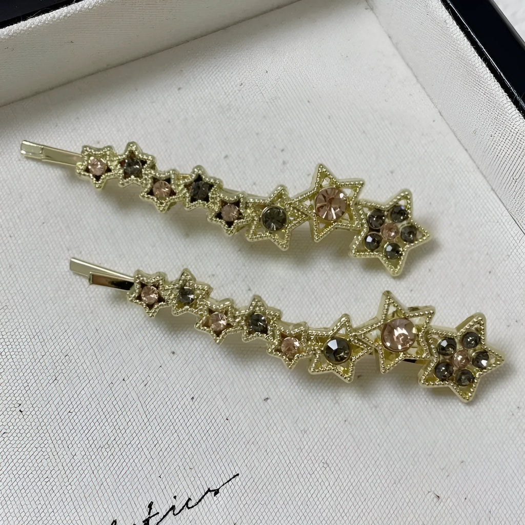 Gold electroplated alloy rhinestone barrettes with side clip bangs design and five-pointed star charms