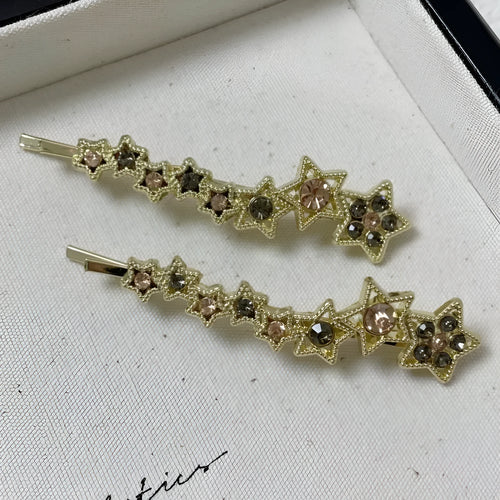 Gold electroplated alloy rhinestone barrettes with side clip bangs design and five-pointed star charms