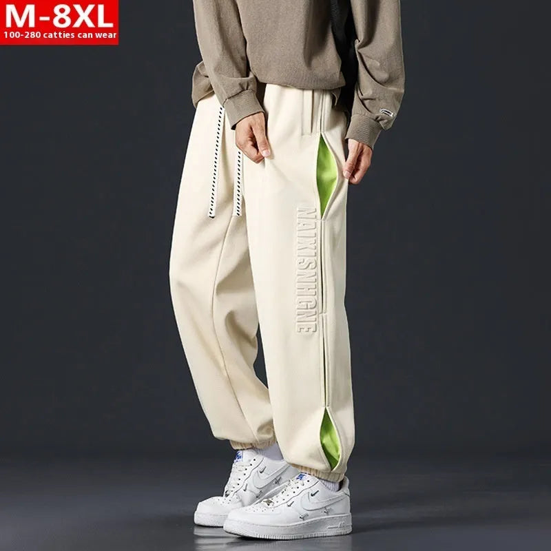 Men's loose-fit cotton trousers with ankle banded design in grey green colour