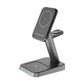 Black vertical cube-shaped wireless charger with phone and watch dock, showing 10000mAh power bank capacity.