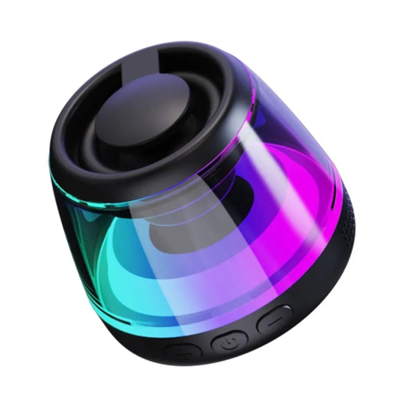 Small round portable wireless Bluetooth speaker with mood lighting in black or white colour, showing magnetic base.