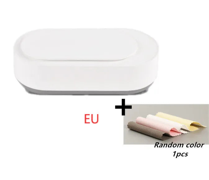 White portable ultrasonic cleaner with stainless steel tank and a single control button.