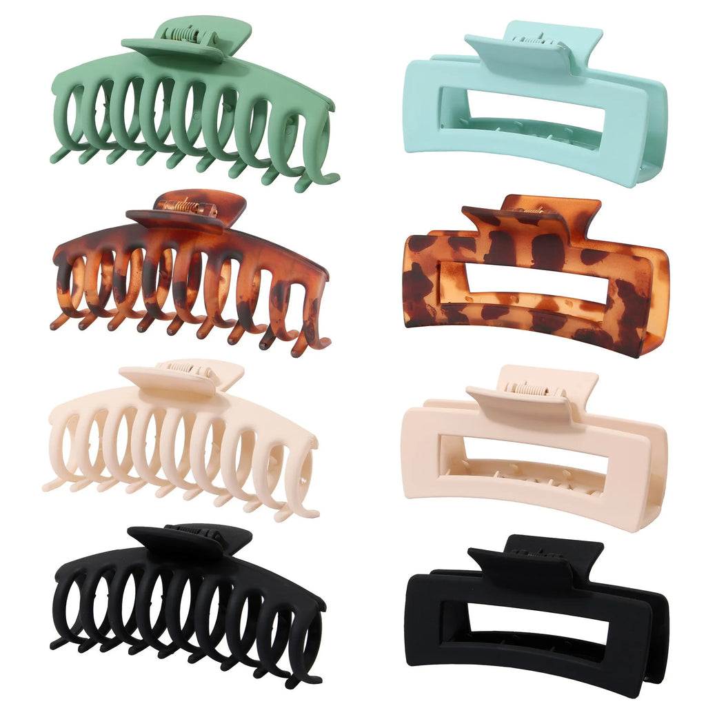 Six nude and rose red plastic hair clips with quadrilateral frosted grip design on white background