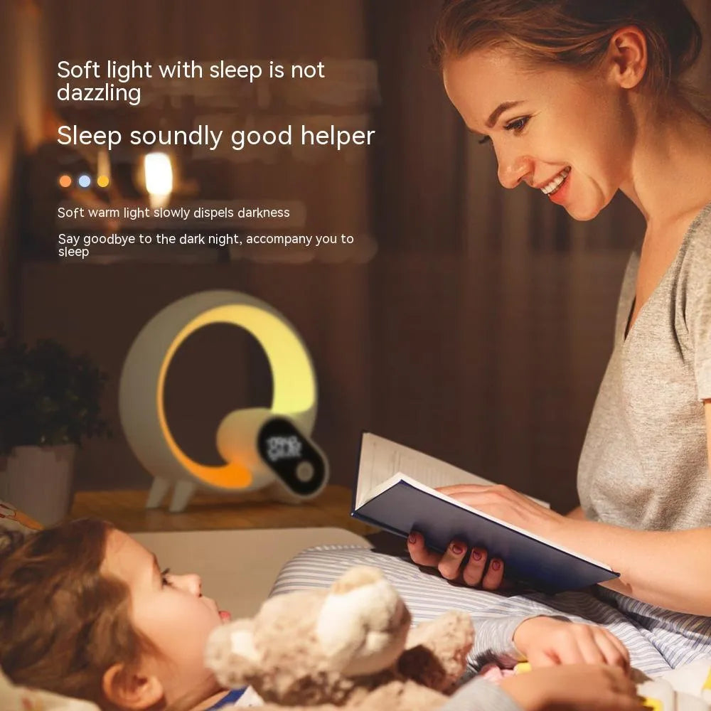 Creative Q Light analog sunrise digital alarm clock with 90 RGBCW light beads in black on wooden table