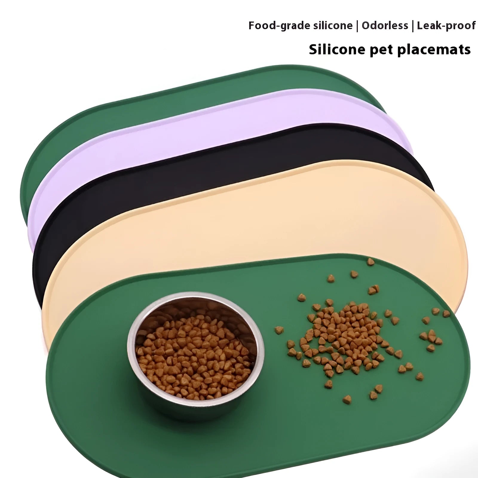 Silicone cat feeding placemat in beige colour, shown under food and water bowls on a kitchen floor.
