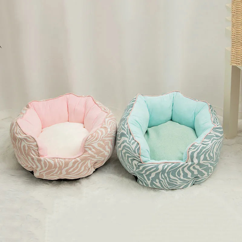 Blue octagonal pet bed with raised sides and a removable mat, for a small dog or cat.