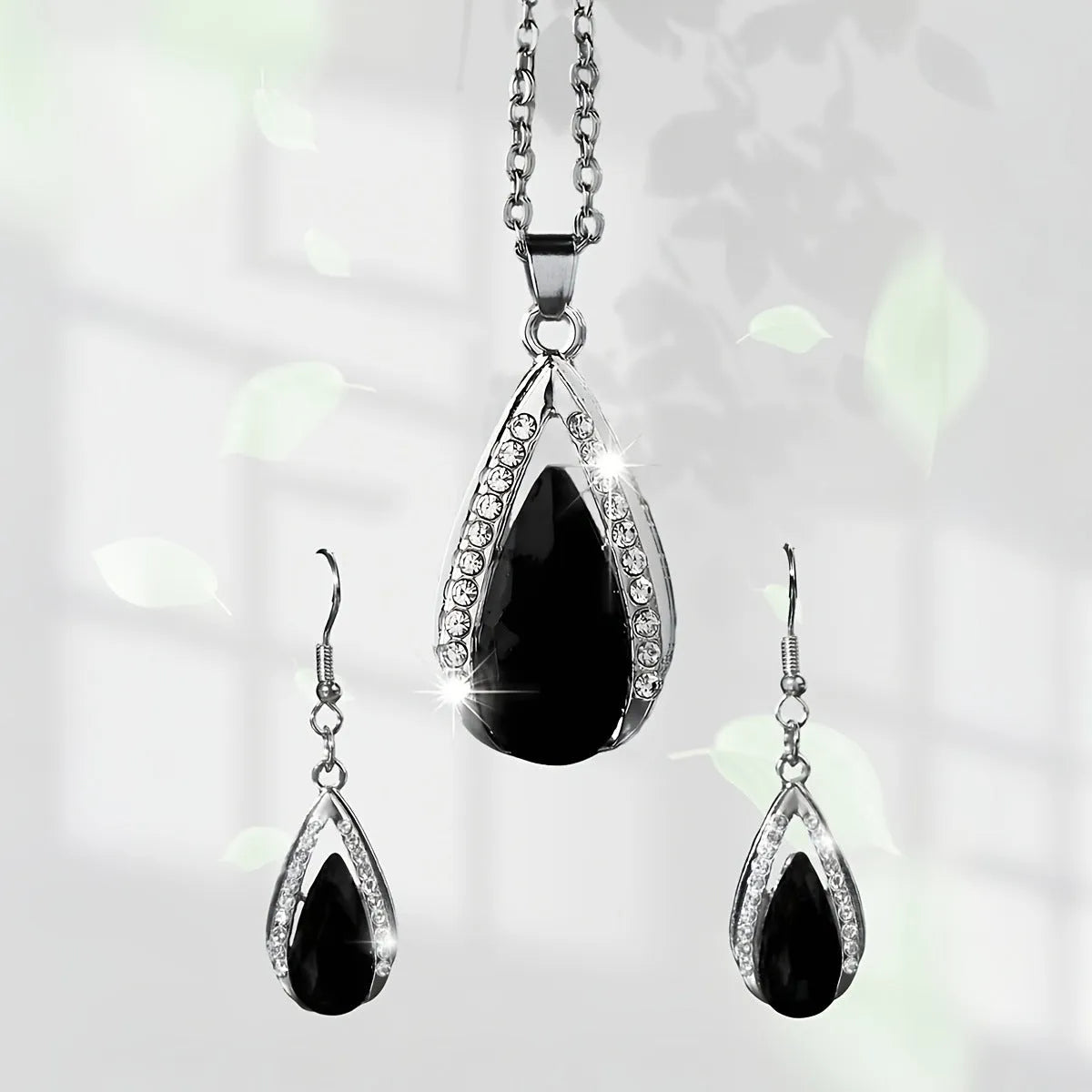 Black and red teardrop glass pendant necklace with matching earrings jewellery set
