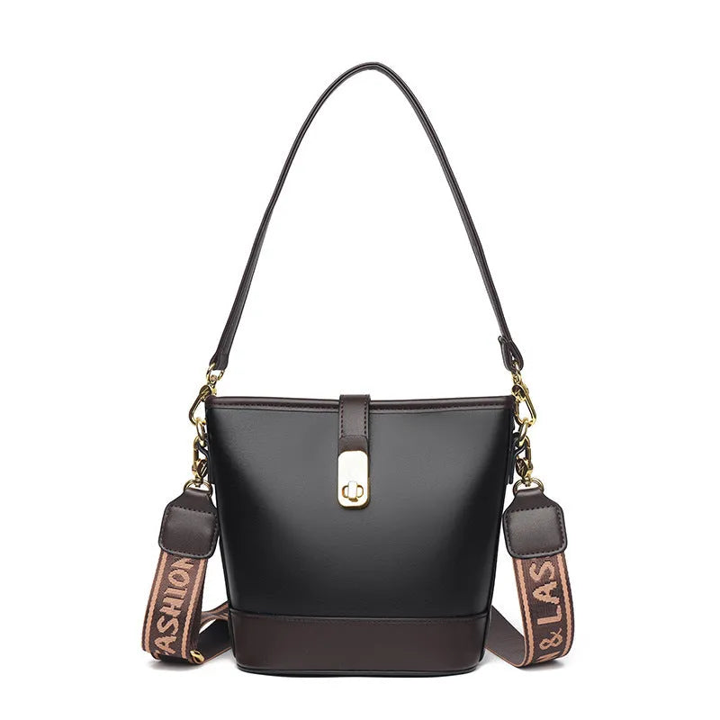 Korean style soft PU bucket messenger bag with double shoulder straps in black colour showing sandwich pocket and sewing thread details