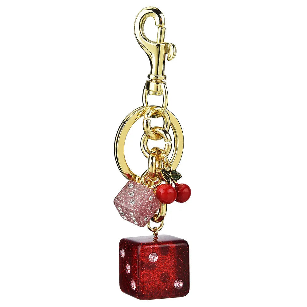 Square metal keychain pendant with a vintage cherry two-tone dice pattern for luggage or bags.
