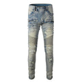 Men's light blue slim fit distressed stretch jeans with hand-frayed detailing on a mid waist with zipper fly.
