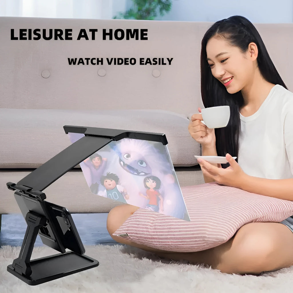 Black 12-inch mobile phone screen amplifier with detachable phone holder on desktop