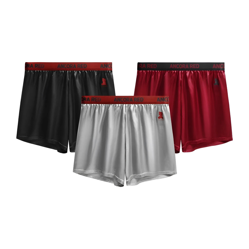 Men's solid colour boxer briefs in polyester knit fabric showing mid waist design and colour options