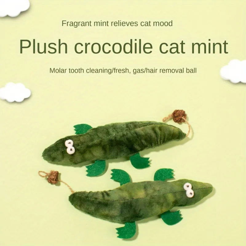 Green plush alligator cat toy with plant-based catnip and peppermint scent for oral cleansing and stress relief