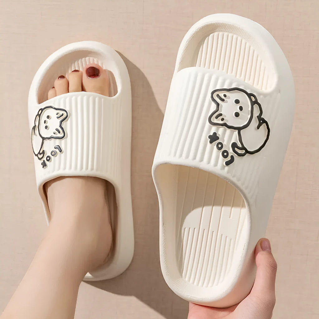 Green EVA foam cat slippers with thick platform sole and anti-slip pattern.