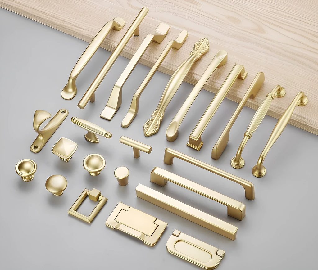 Gold T-shaped aluminium alloy single-hole cabinet door handle on a white background