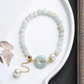 Women's jade pearl bracelet with natural emerald peace buckle charm in geometric national style