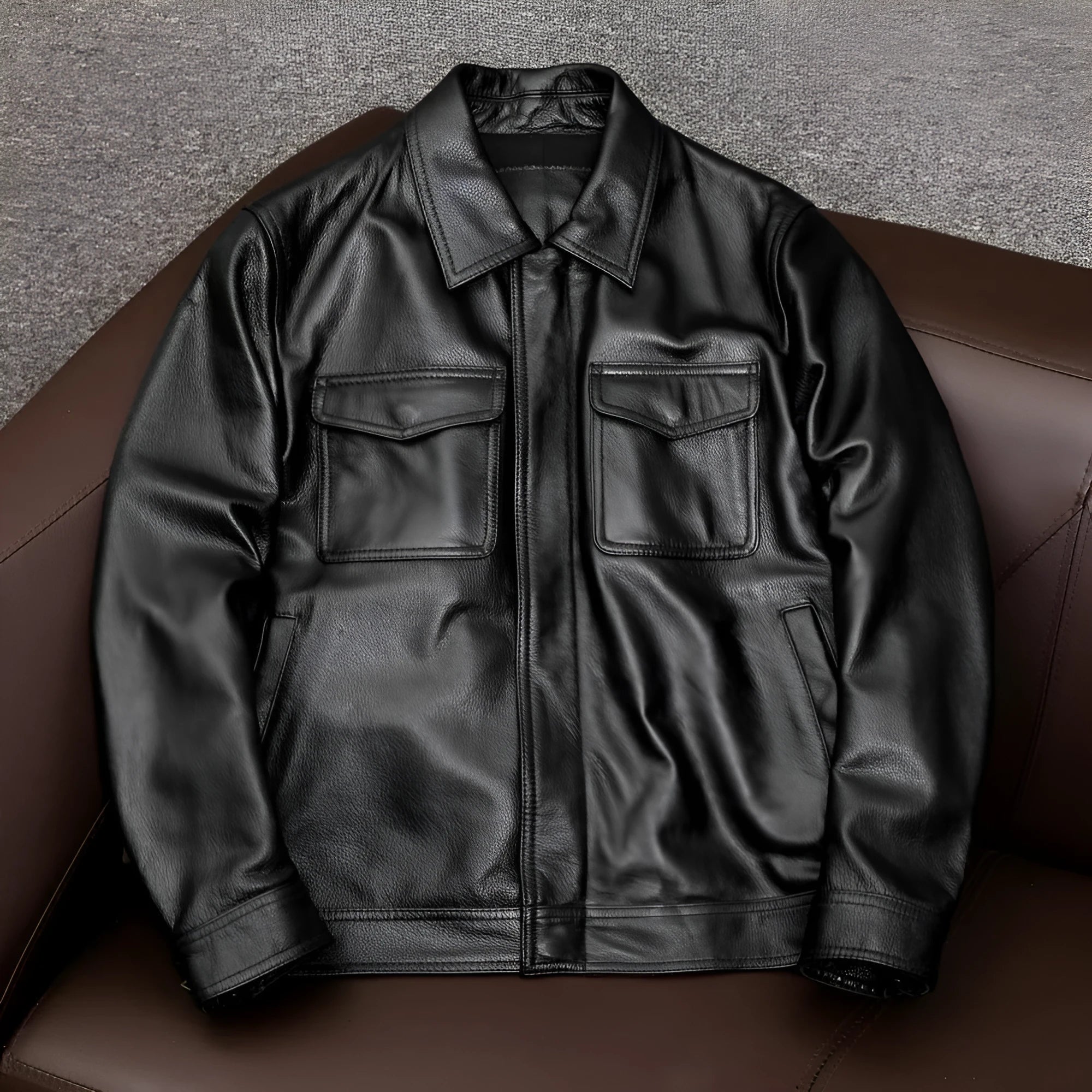 Men's black plus size lapel short leather jacket with side seam pockets, shown in a loose casual fit.