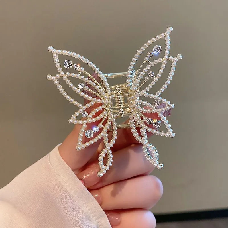 Butterfly design hair barrette for women with alloy construction and decorative rhinestone or pearl styling