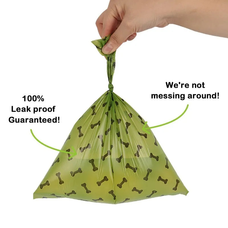 Degradable dog poop bags in military green with black bone print, showing roll format and bag dimensions