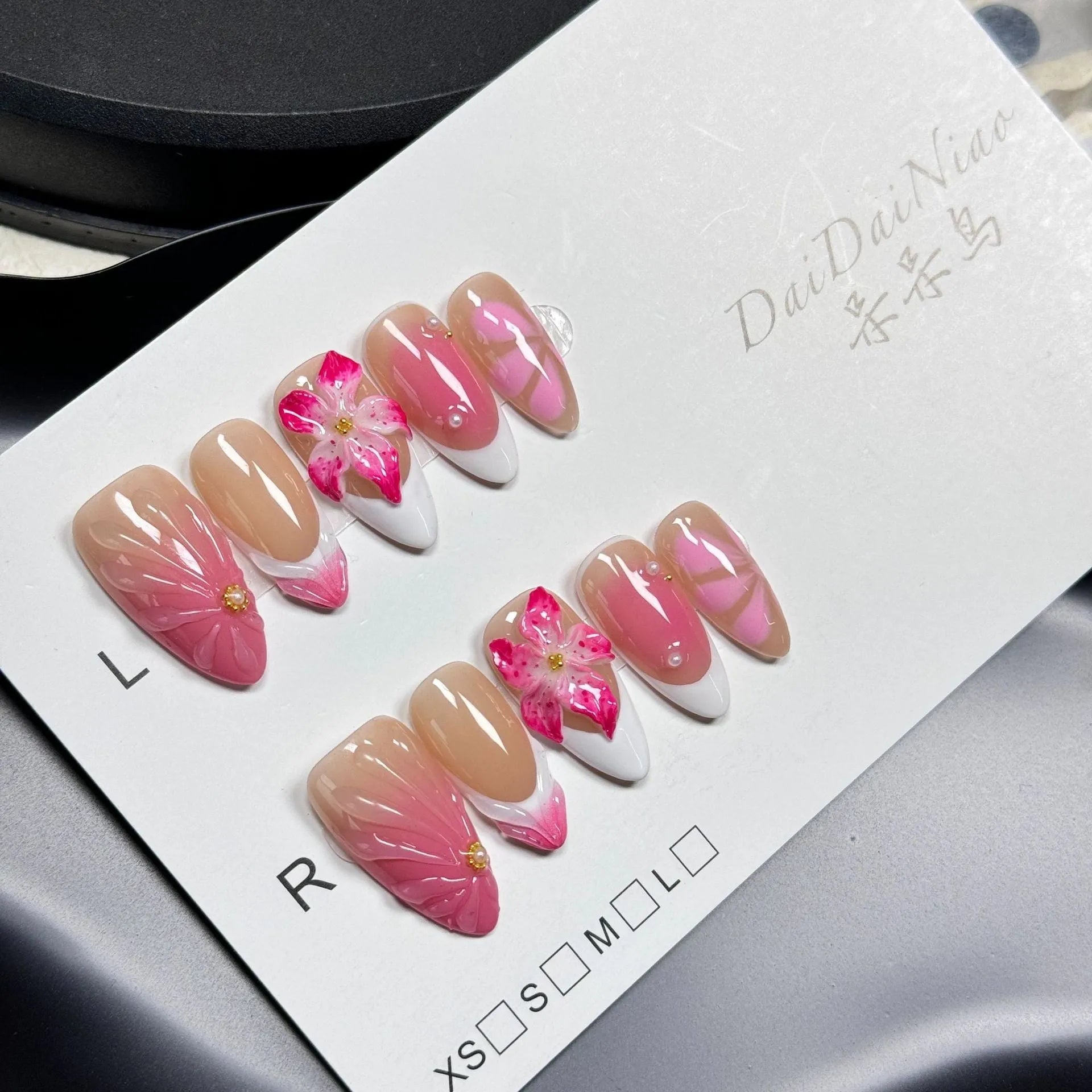 French Style Lily Fluid Ice Flower three-dimensional plastic nail art armour set in almond style.