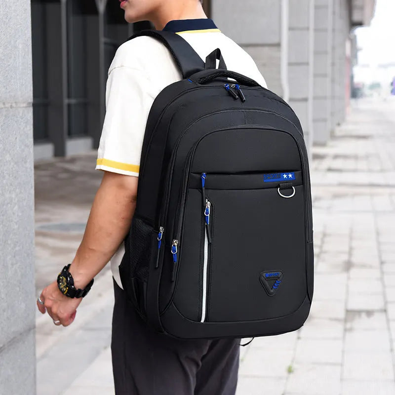 Men's Oxford cloth schoolbag in black with air pillow belt system and 20-35L capacity
