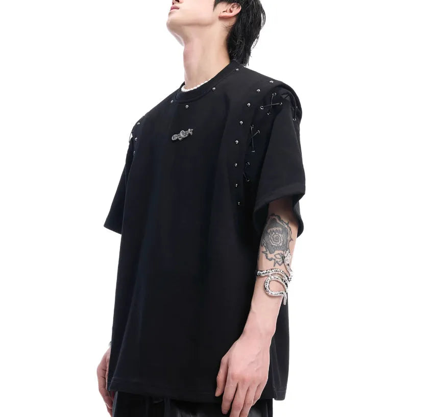 Women's black deconstruction short sleeve t-shirt with a white lace-up detail and front cutout.