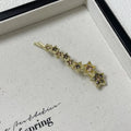 Gold electroplated alloy rhinestone barrettes with side clip bangs design and five-pointed star charms
