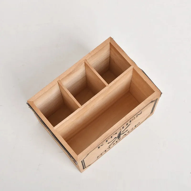 Wooden kitchen storage box for knives, forks, and chopsticks with internal dividers.