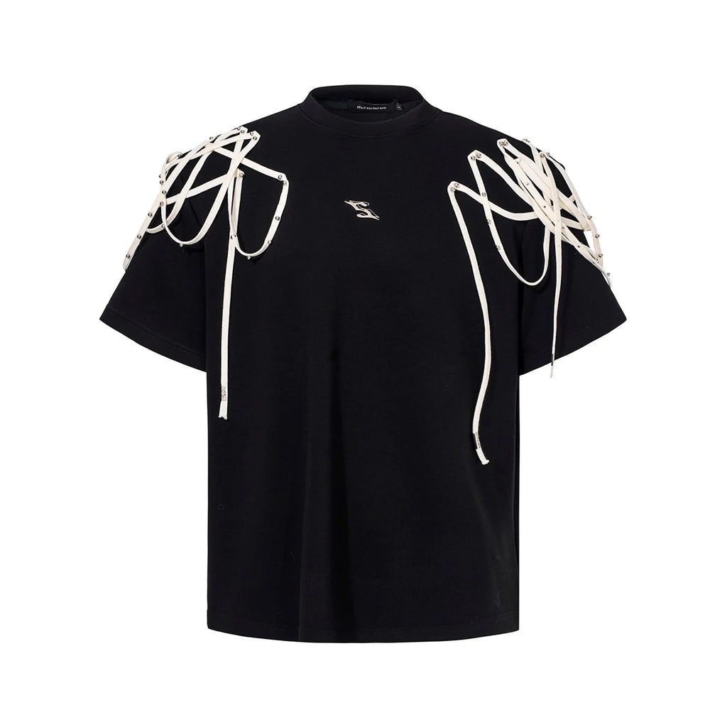 Black loose fit T-shirt with padded shoulder detail and rivet ribbon accent.