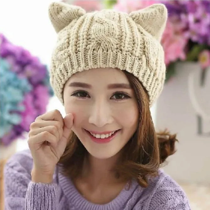 Hand made 3D knitted cat ear winter beanie in wool, shown in multiple colour options
