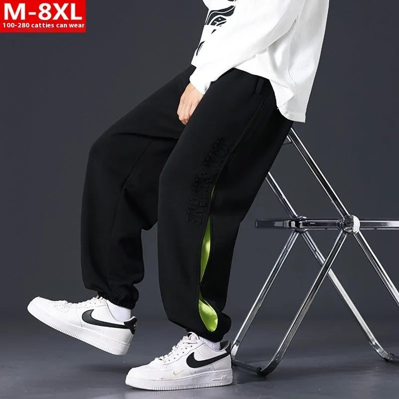 Men's loose-fit cotton trousers with ankle banded design in grey green colour