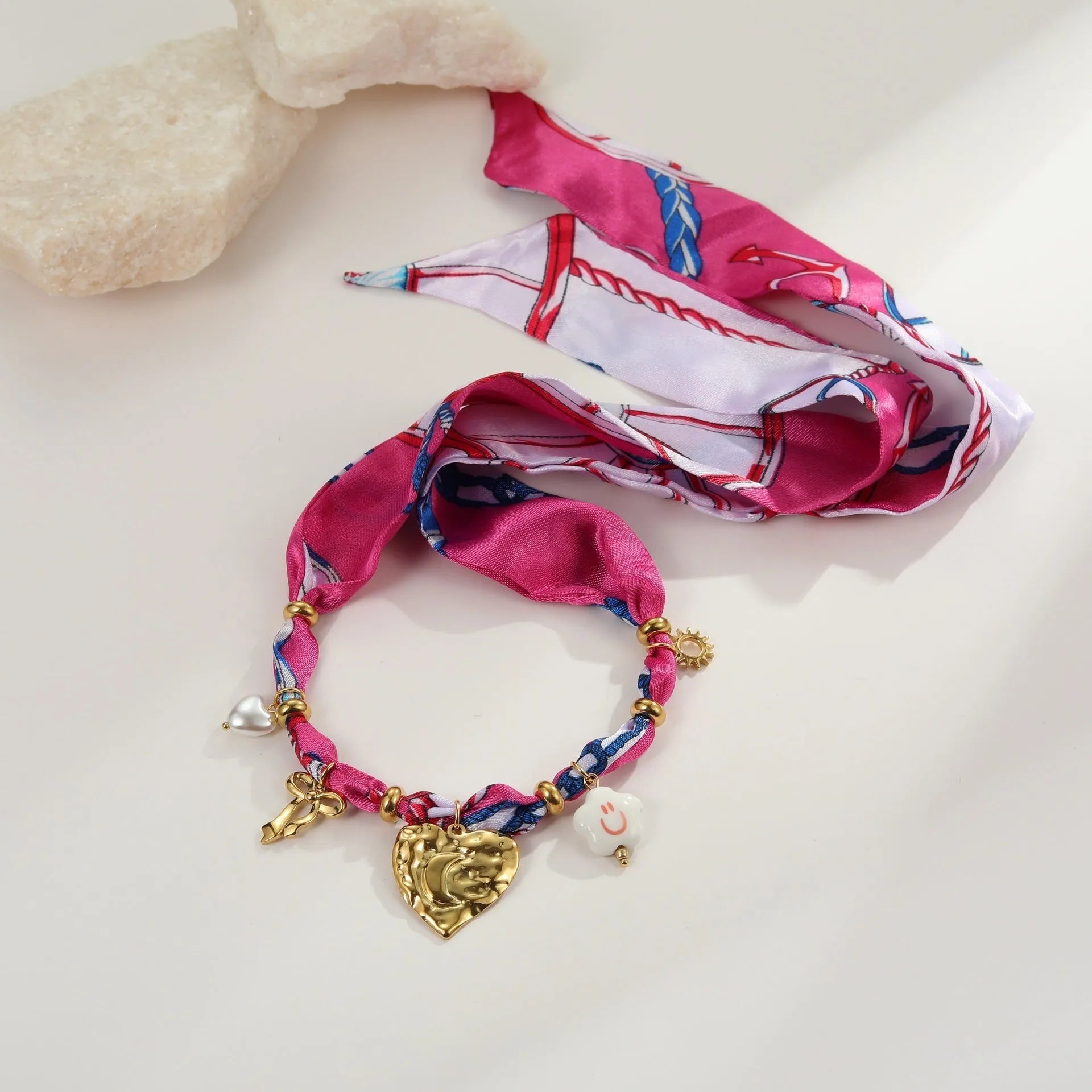 Gold-plated stainless steel necklace and bracelet set with geometric love pendant on adjustable chain